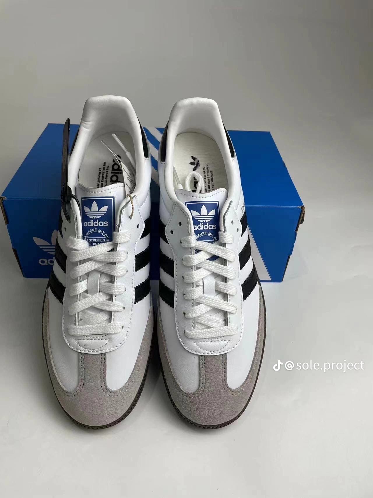 Classic White & Black Sneakers – Premium Casual Shoes